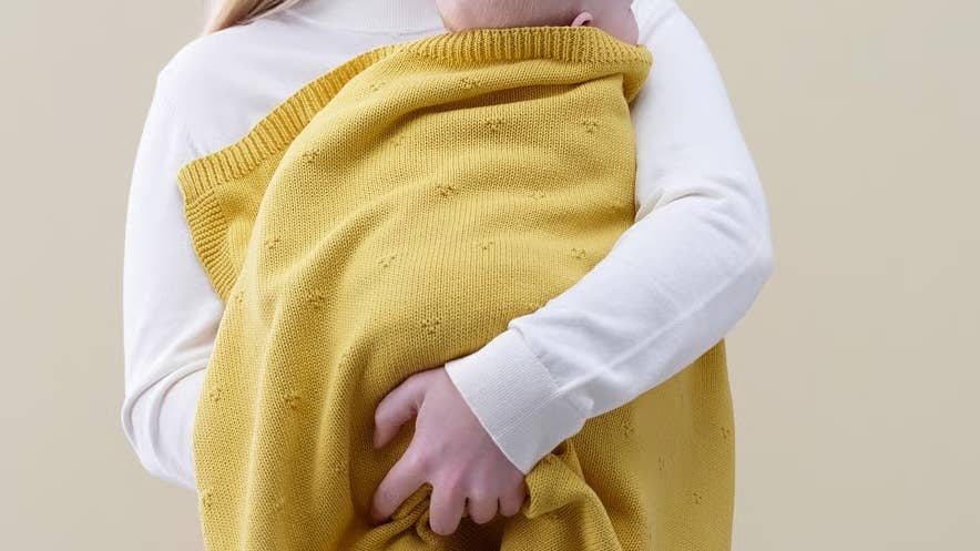 This New Organic Cotton Knitted Baby Blanket From IKEA Is So Soft and Cozy—and C...